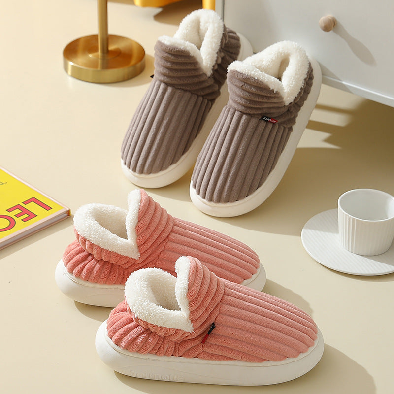 Warm indoor couple slippers with fleece lining and anti-slip soles in pink and brown, ideal for winter comfort and fashion.